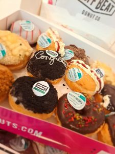 ESI Technologies Group celebrates Platinum EcoVas Award with Off Beat Donuts
